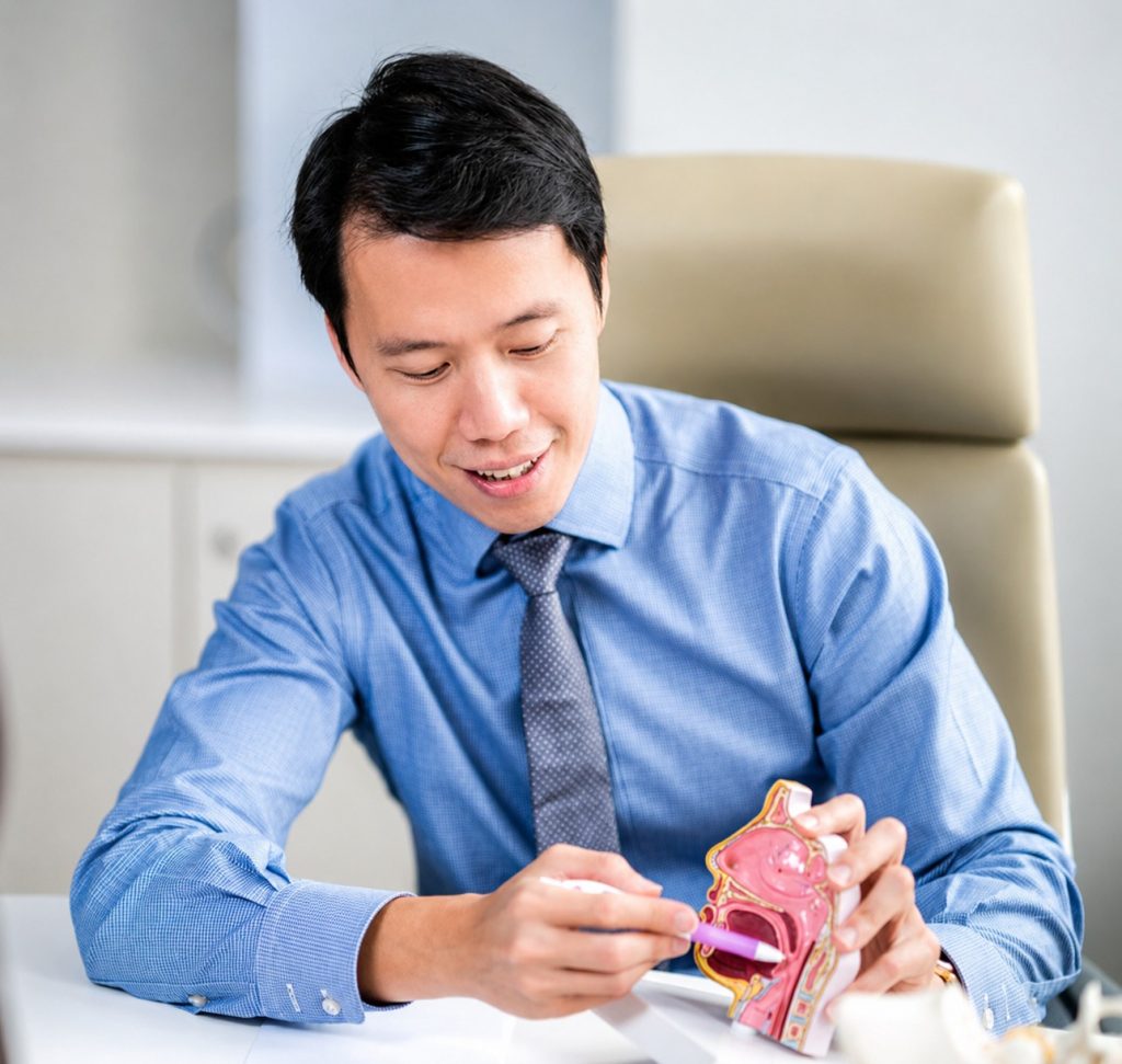 Dr-Dennis-Chua-ENT-Specialist-In-Singapore-teaching
